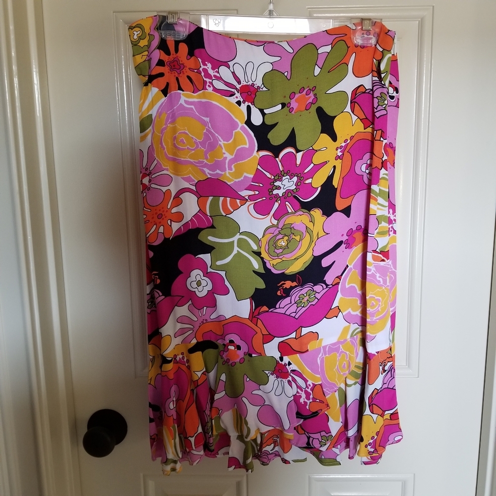 Bright colorful skirt with sweater.